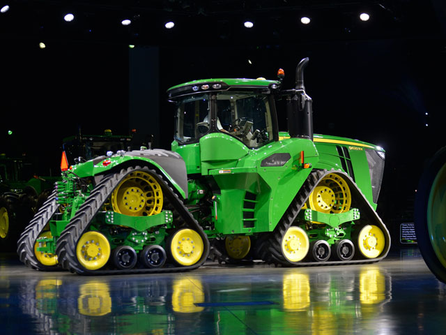 In a year when manufacturers cut back on new product line introductions, John Deere teased spectators at its annual dealer meeting with this four-track prototype due for launch "sometime in the future," according to John Lagemann, senior vice president. (DTN/The Progressive Farmer photo by Jim Patrico)