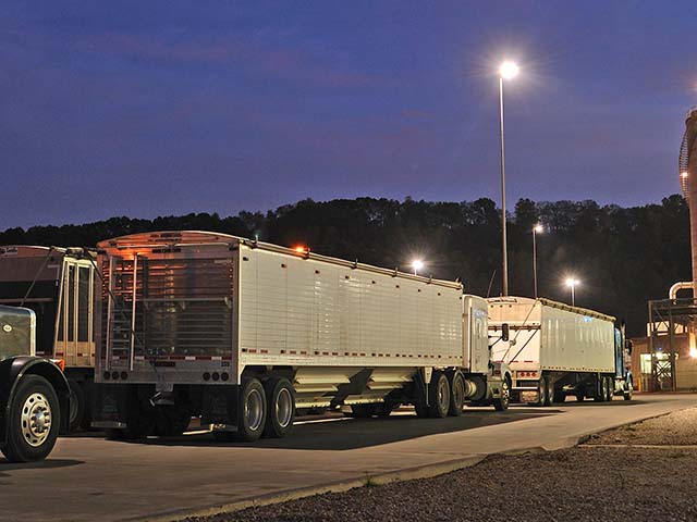 Loaded semi-trucks wait to dump corn at a Cargill elevator and biodiesel plant in Kansas City, Missouri. (Progressive Farmer photo by Jim Patrico)