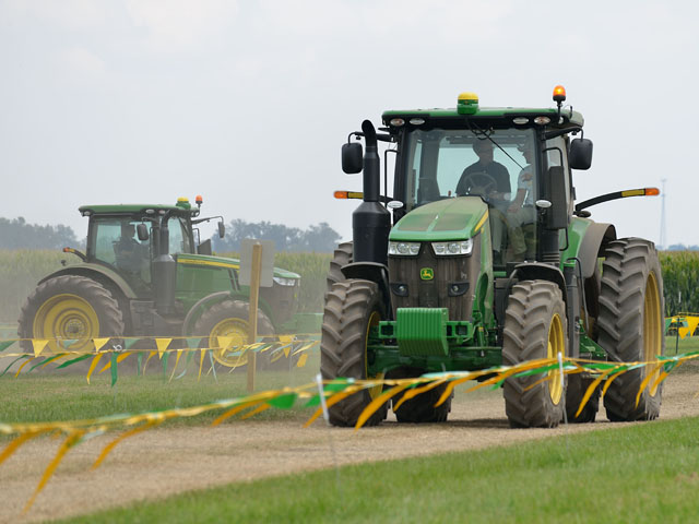 Main attraction at the reason John Deere new product launch/dealer meeting in Columbus, Ohio, was a line of workhorse tractors including the 7R Series. (DTN/The Progressive Farmer photo by Jim Patrico)