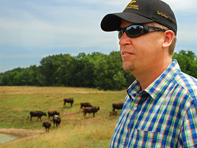 Missouri cattleman Justin Baker earns the premium prices he receives for his beef. He said it takes about four years from breeding to a meal on the table. (DTN/The Progressive Farmer photo)