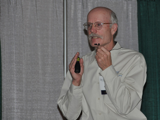 USDA agronomist Randy Anderson presented his research to farmers at the No Till on the Plains annual convention in Salina, Kan. (DTN photo by Emily Unglesbee)