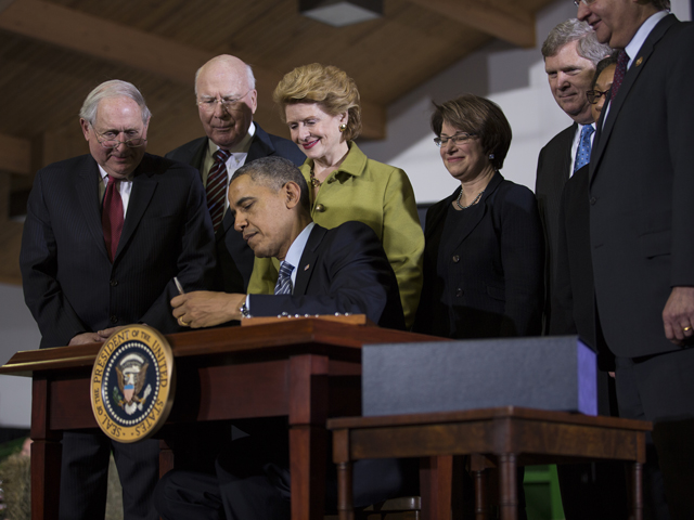 President Barack Obama signed the new farm bill into law Friday. (USDA photo by David Kosling)