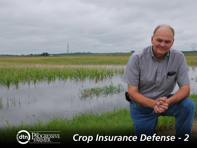 Iowan Dean Taylor forgoes cheaper enterprise coverage because his fields lack uniformity. In 2010, some of his land was inundated while ridges were dry. (DTN photo by Elizabeth Williams)