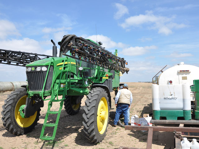 More growers will be trying new tank mix recipes to control problem weeds and to limit sprayer passes. (DTN photo by Katie Micik)