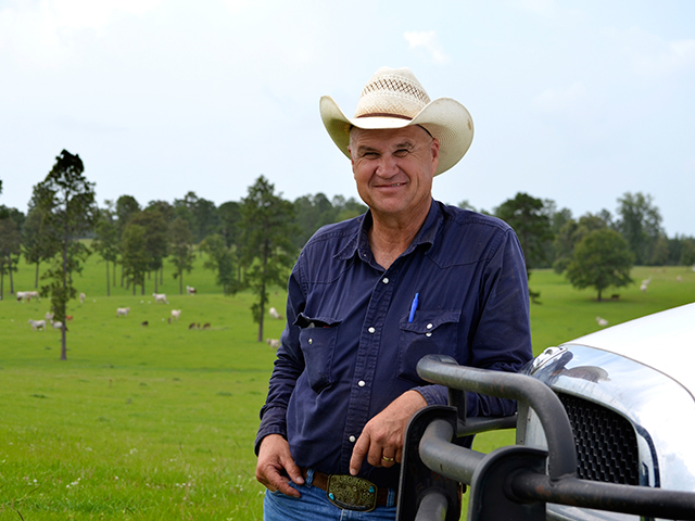 Kenneth Allen runs a herd of Brahman cows and Hereford bulls. When conception rates dipped to 75%, he started looking for answers. (Progressive Farmer photo by Victoria G. Myers)