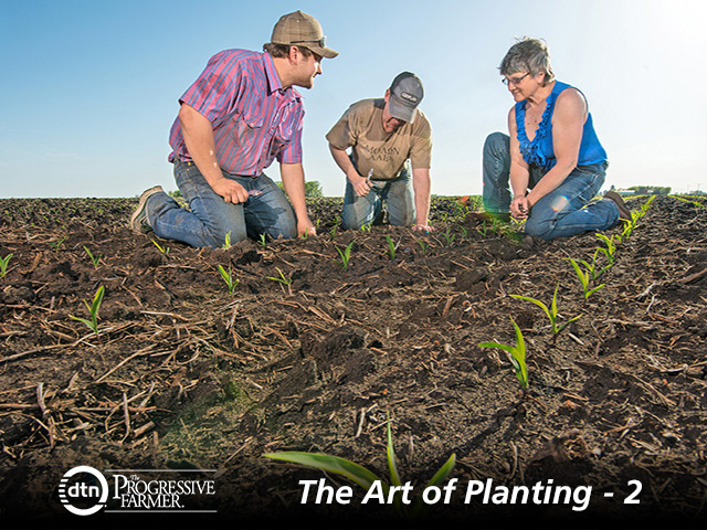 Caleb Krusemark and his parents, Brad and Rochelle, check their planting work as new corn comes up. (Progressive Farmer photo by Tom Dodge)