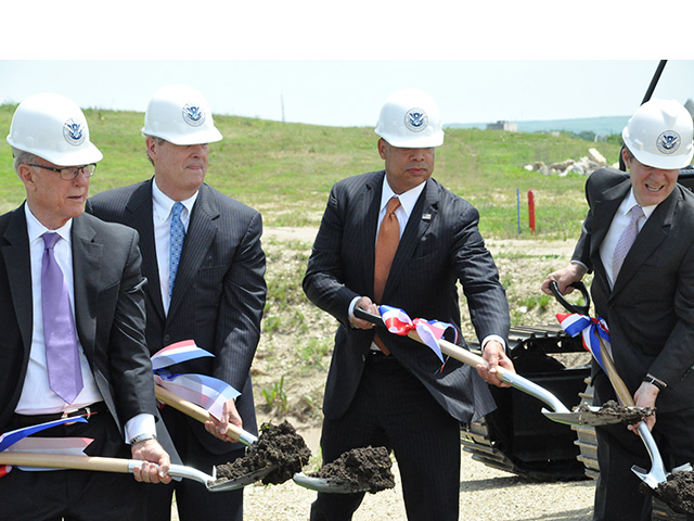 Kansas State University will be home to the $1.25 billion National Bio and Agro-Defense Facility. A groundbreaking ceremony was held in Manhattan on Wednesday. Among those with ceremonial shovels were, from left to right, Sen. Pat Roberts, Agriculture Secretary Tom Vilsack, Department of Homeland Security Secretary Jeh Johnson and Kansas Gov. Sam Brownback. (DTN photo by Chris Clayton)