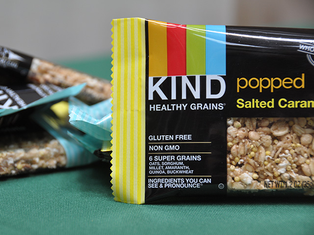 Kind granola bars trumpet their non-GMO status and use of popped kernels of sorghum, which is enjoying new consumer interest in part thanks to its lack of genetic engineering. (DTN photo by Emily Unglesbee)
