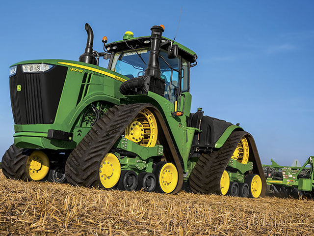 The new 9RX tractor marks John Deere's first entry into the four-track category and rounds out its 9 Series, which already had wheels and two tracks. (Photo courtesy John Deere)