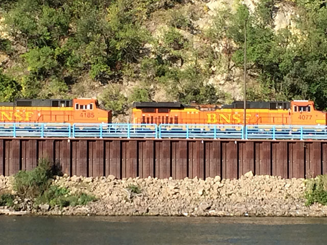 A BNSF train heads east along the Mississippi River near St. Paul, Minnesota. (DTN photo by Mary Kennedy)